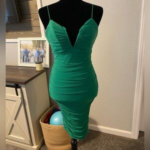 Size Medium cocktail dress, beautiful emerald green color